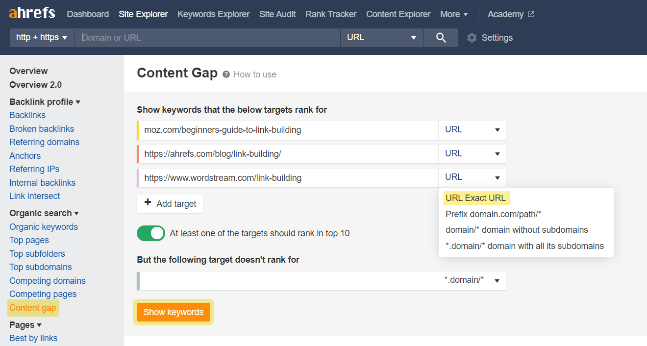 Ahrefs Content Gap 工具。用于填写竞品 URL 的文本框。下方是填写你自己网站 URL 的文本框