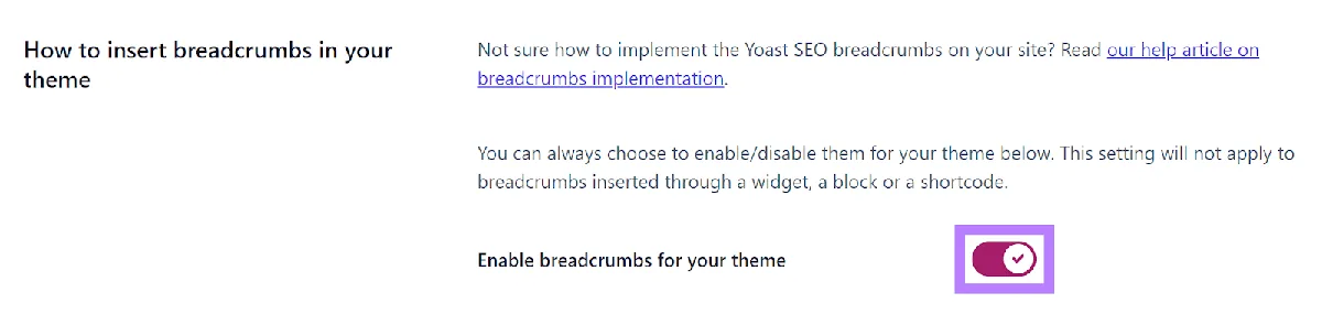 Yoast SEO 中的面包屑设置页面,“Enable breadcrumbs for your theme”选项高亮