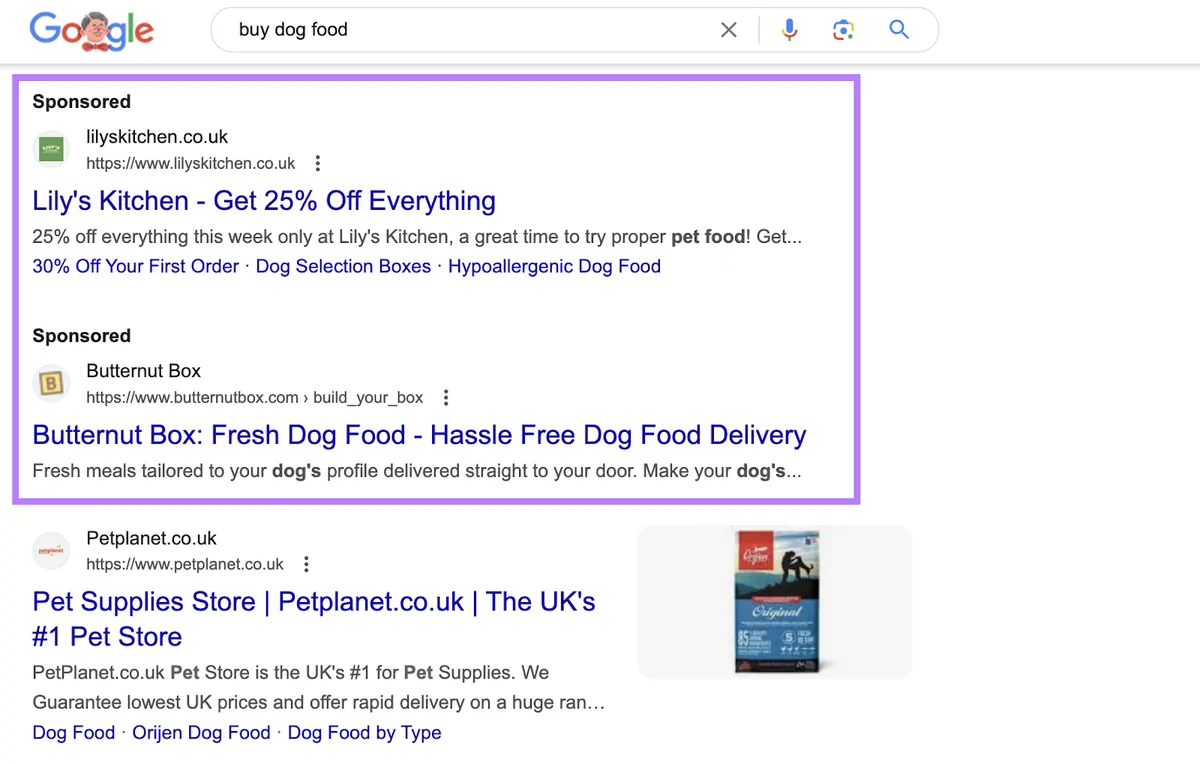 搜索引擎结果页面 (SERP) 上针对“buy dog food”查询的搜索广告