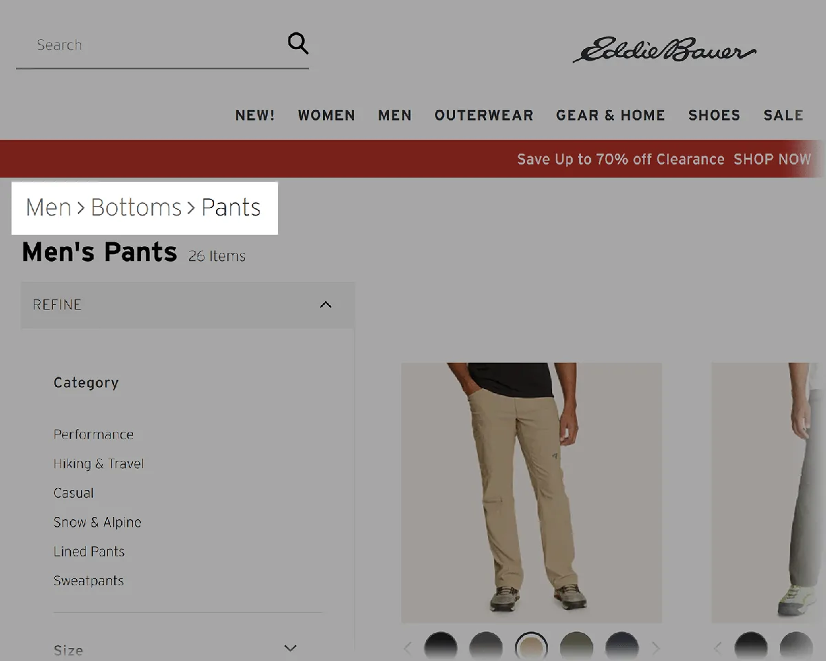 Eddie Bauer 男裤页面，产品列表上方显示面包屑路径 男装 > 下装 > 长裤。