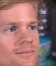 眨眼男子表情包 GIF。